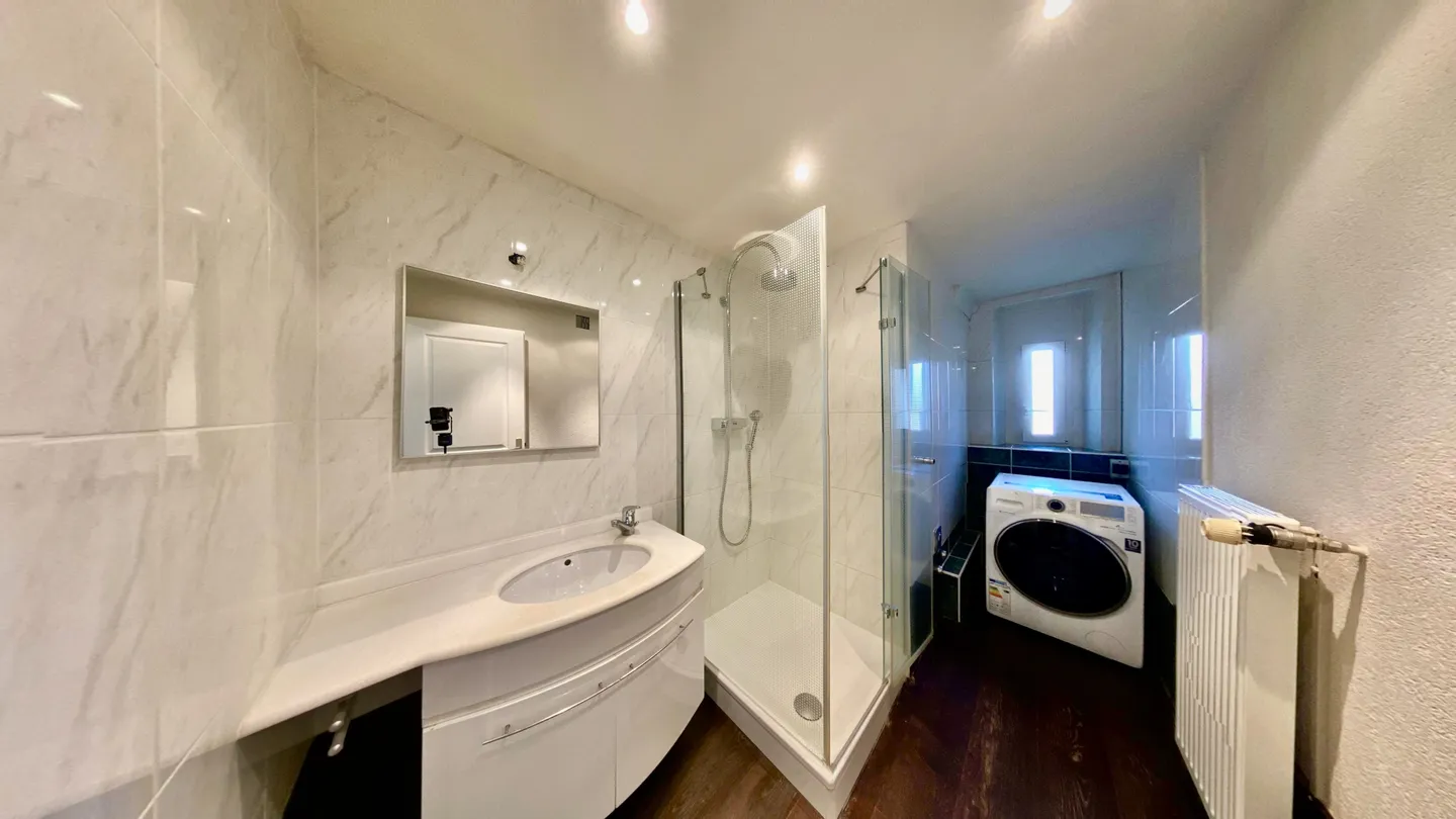 Charmant duplex dans un immeuble classique - Photo 9 sur 10