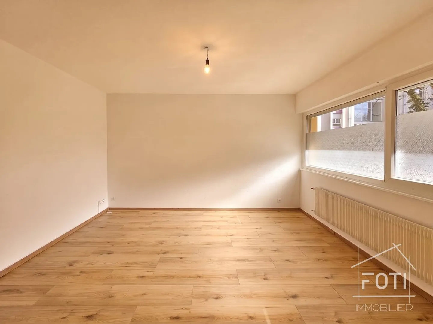 Appartement rénové avec rendement - Photo 4 sur 8