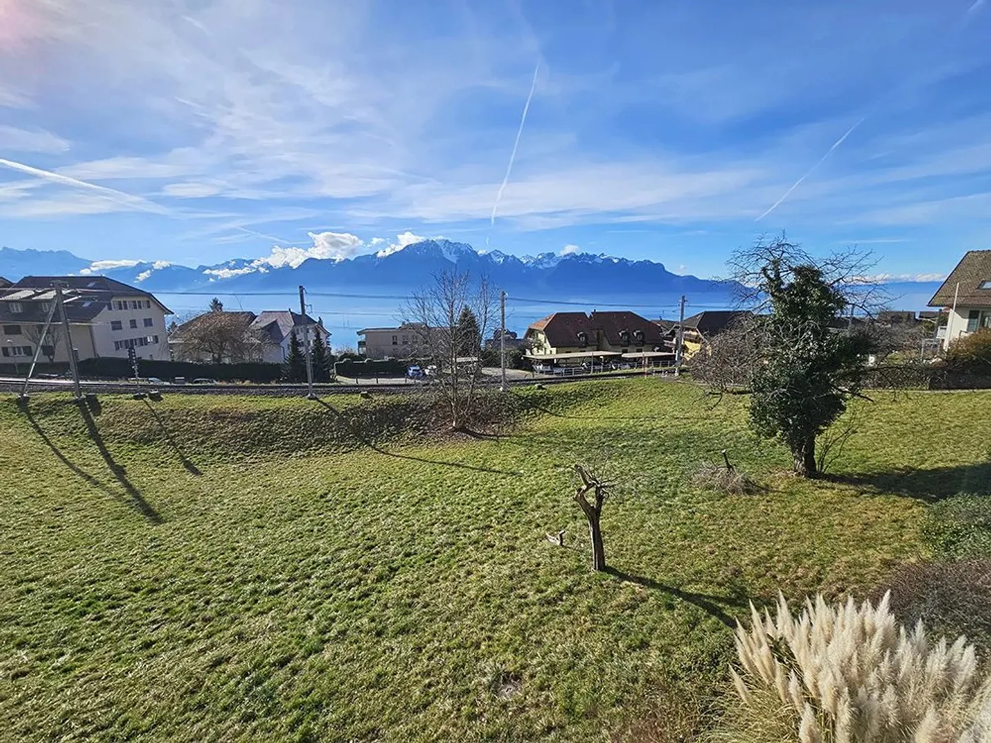 3,5-Zimmer-Wohnung mit schönem Blick auf den See und die Berge - Foto 1 von 8