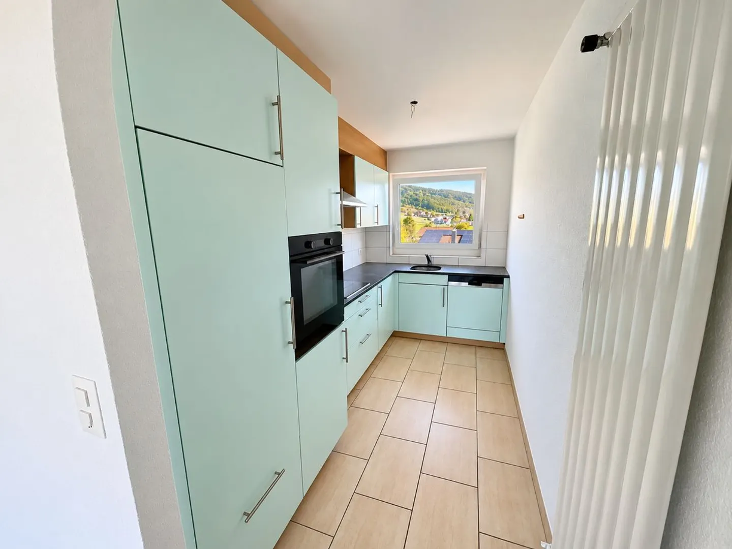 Schöne 3,5-Zimmer-Wohnung mit Balkon und freiem Blick - Foto 1 von 11