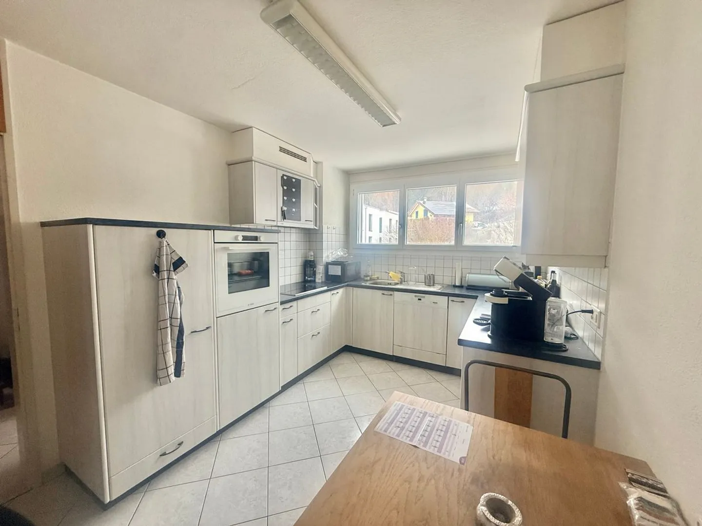 Appartement traversant de 3 pièces avec balcon et ascenseur - Photo 7 sur 13