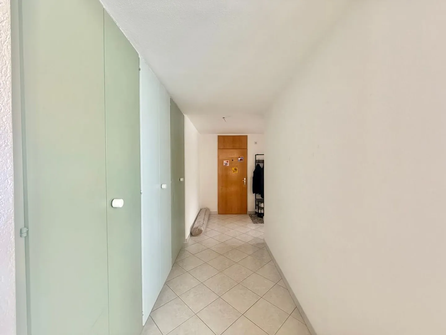 Appartement traversant de 3 pièces avec balcon et ascenseur - Photo 3 sur 13