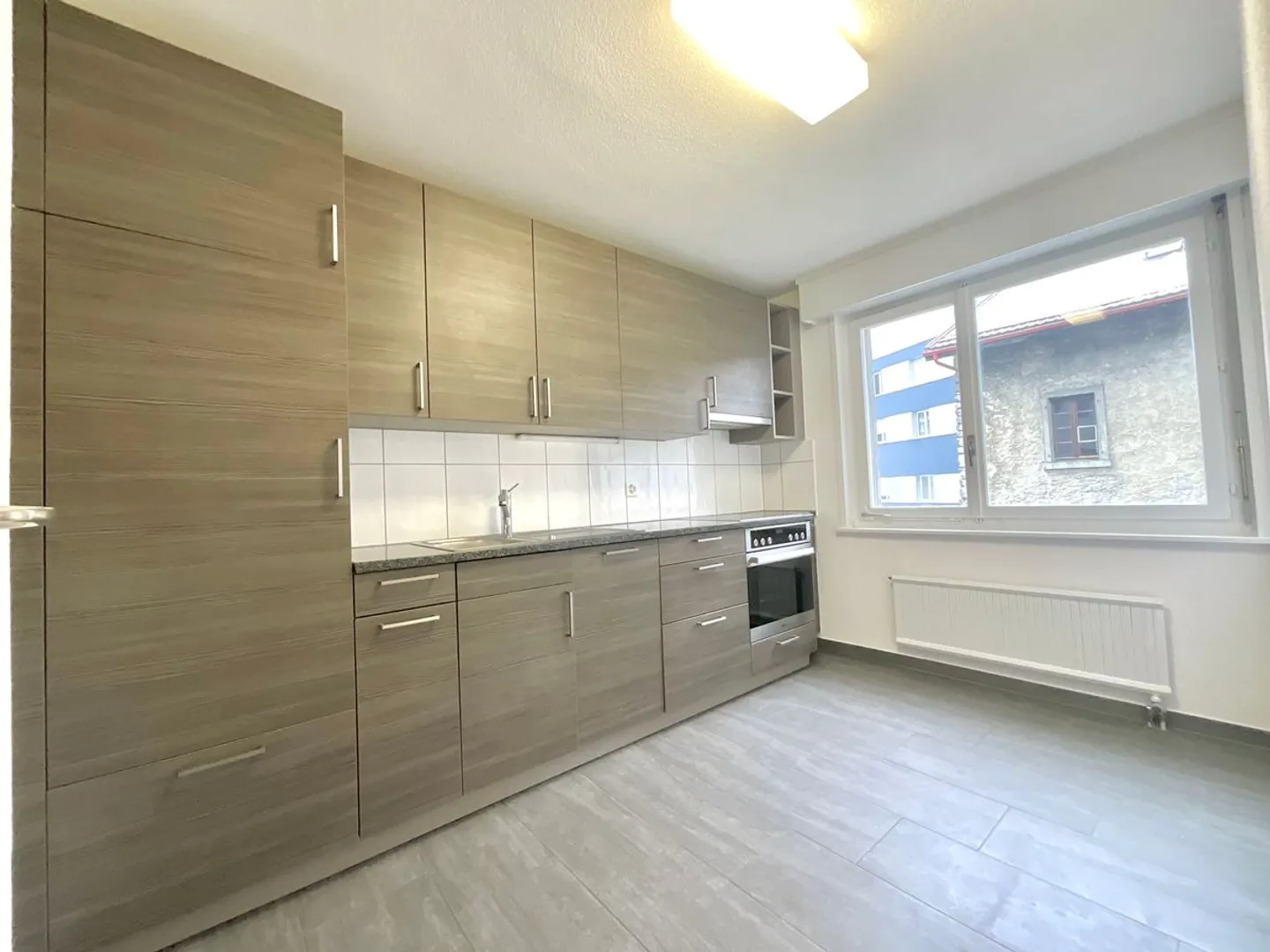 Charming 3.5-room apartment with balcony - Photo 2 of 7
