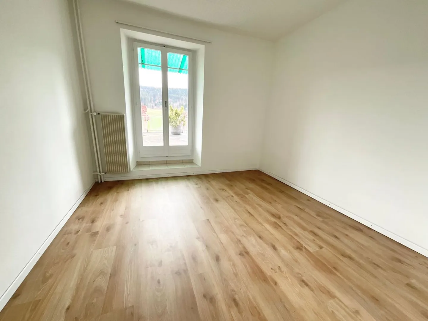Charming 4-room apartment with large terrace in the heart of Tramelan - Photo 8 of 10