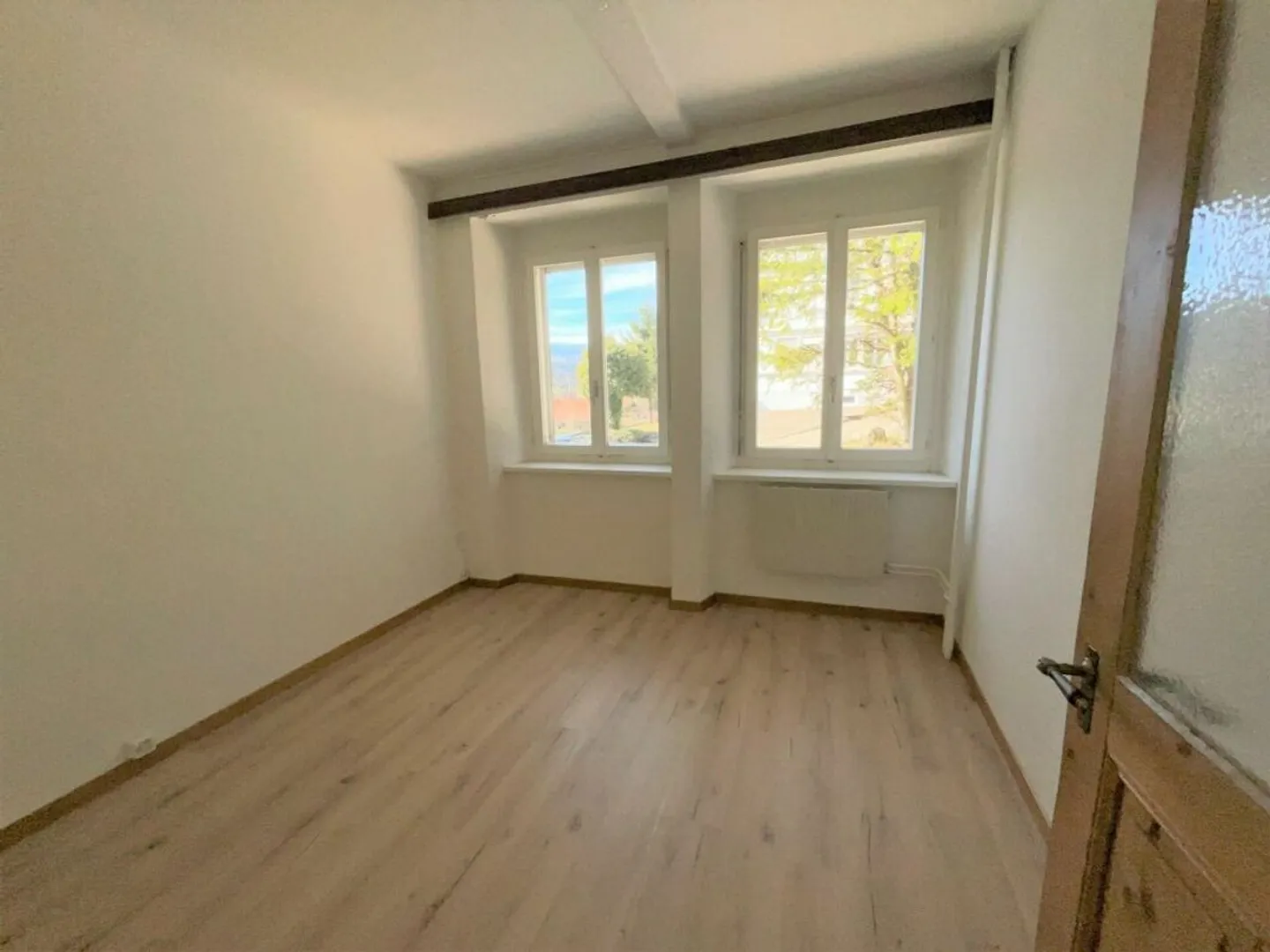 Appartement de 4 pièces au rez-de-chaussée - Photo 4 sur 6