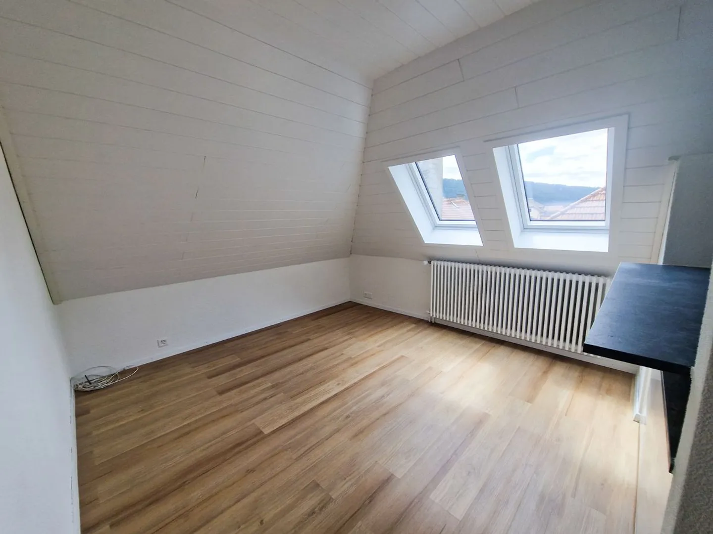 Charmant appartement mansardé de 2,5 pièces - Photo 5 of 8