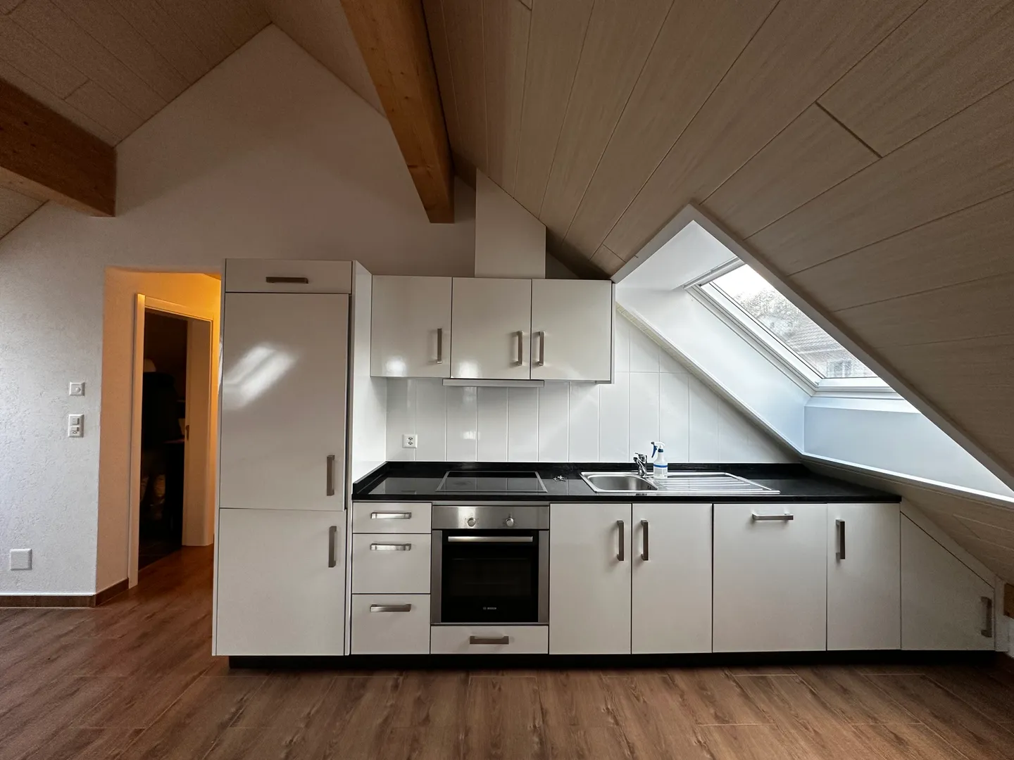 Charming 4.5-room renovated attic in Courtedoux 90 m² + parking - Photo 8 of 13