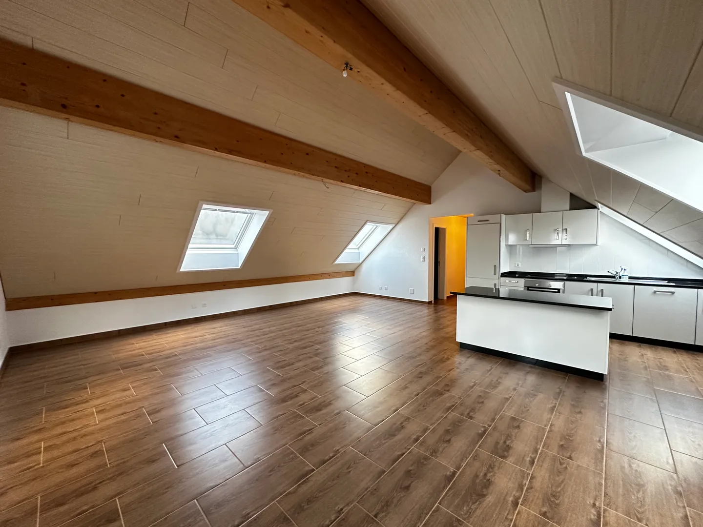 Charming 4.5-room renovated attic in Courtedoux 90 m² + parking - Photo 1 of 13