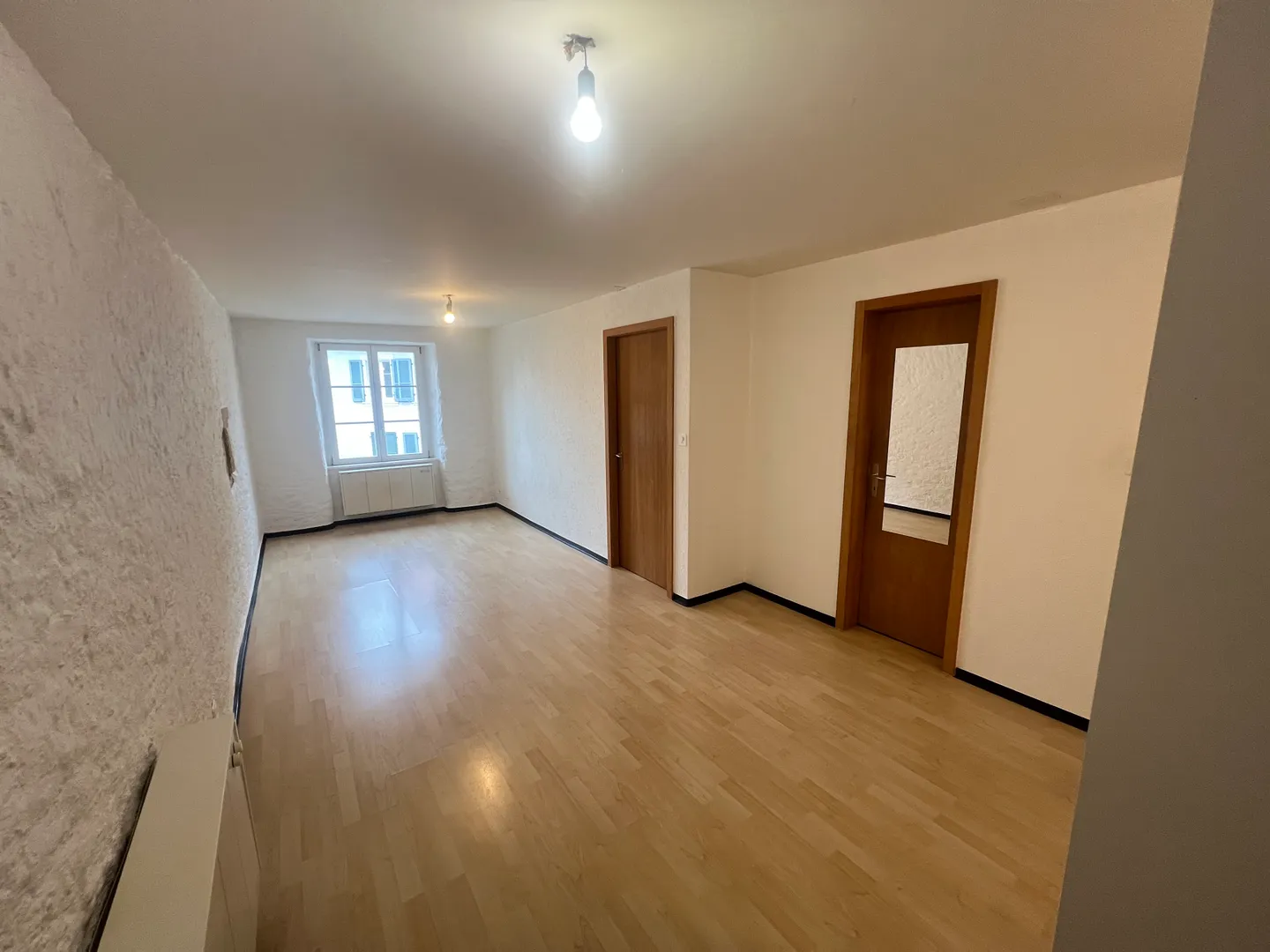 Bright 2.5-room apartment   2nd floor, street side   Rue du Collège 25 - Photo 2 of 12