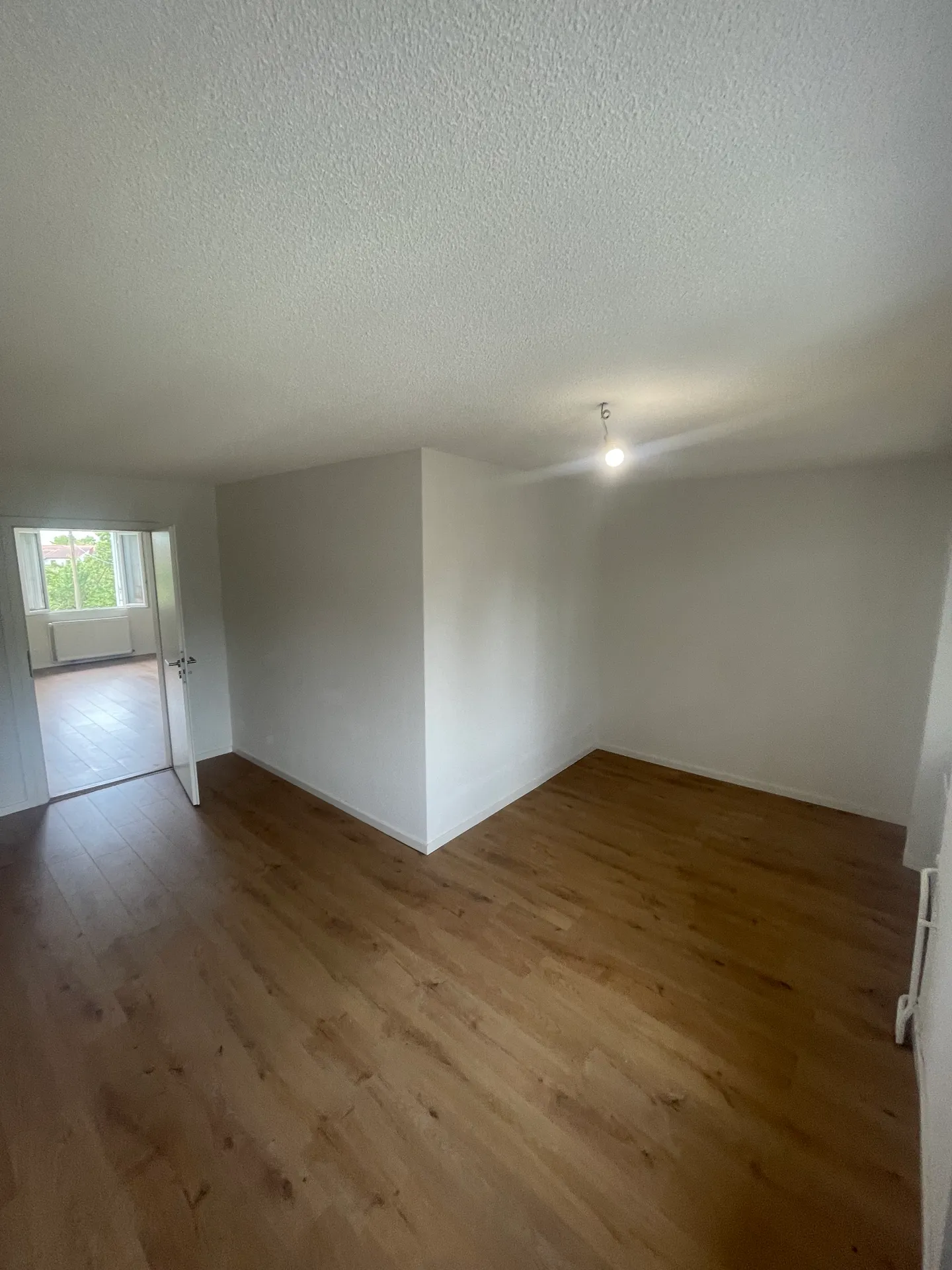 Charming 2.5 room bright apartment with parking space in a peaceful setting in Alle - Photo 5 of 13