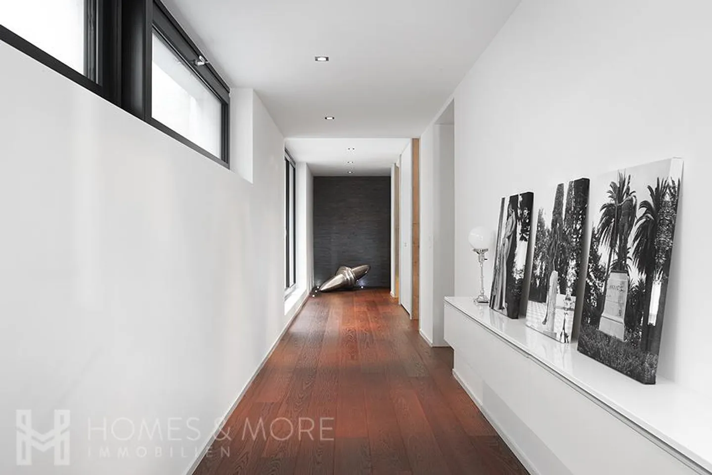MODERN ARCHITECTURE MEETS QUIET RESIDENTIAL LOCATION - Photo 1 of 4