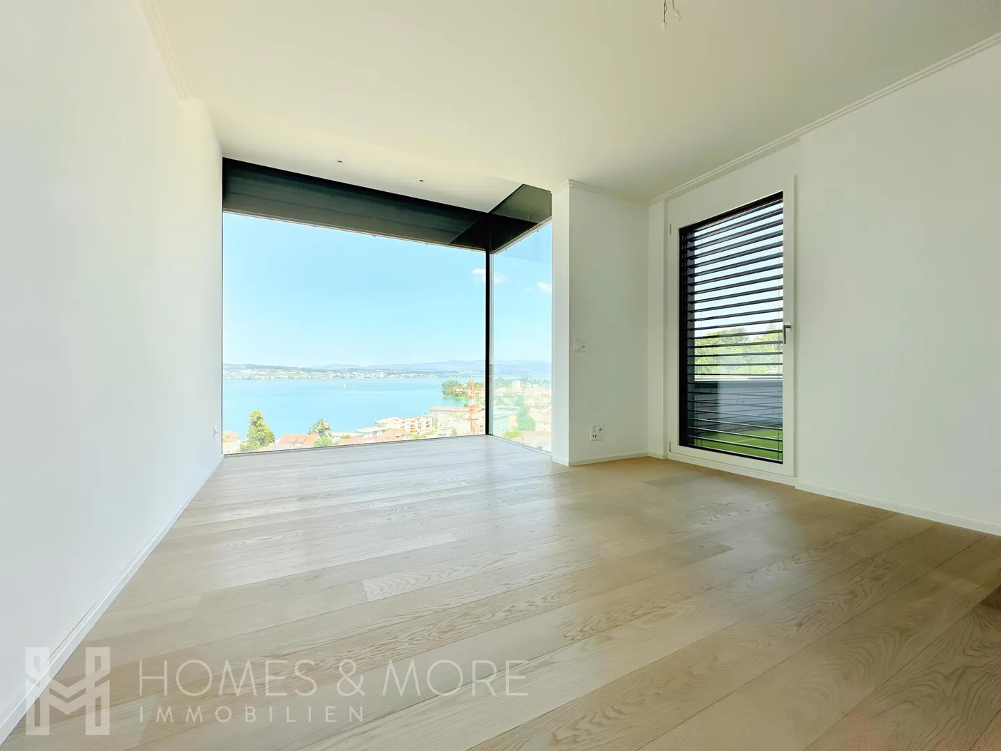 LUXURIOUS WITH PANORAMIC LAKE VIEW AND WELLNESS AREA - Photo 4 of 10