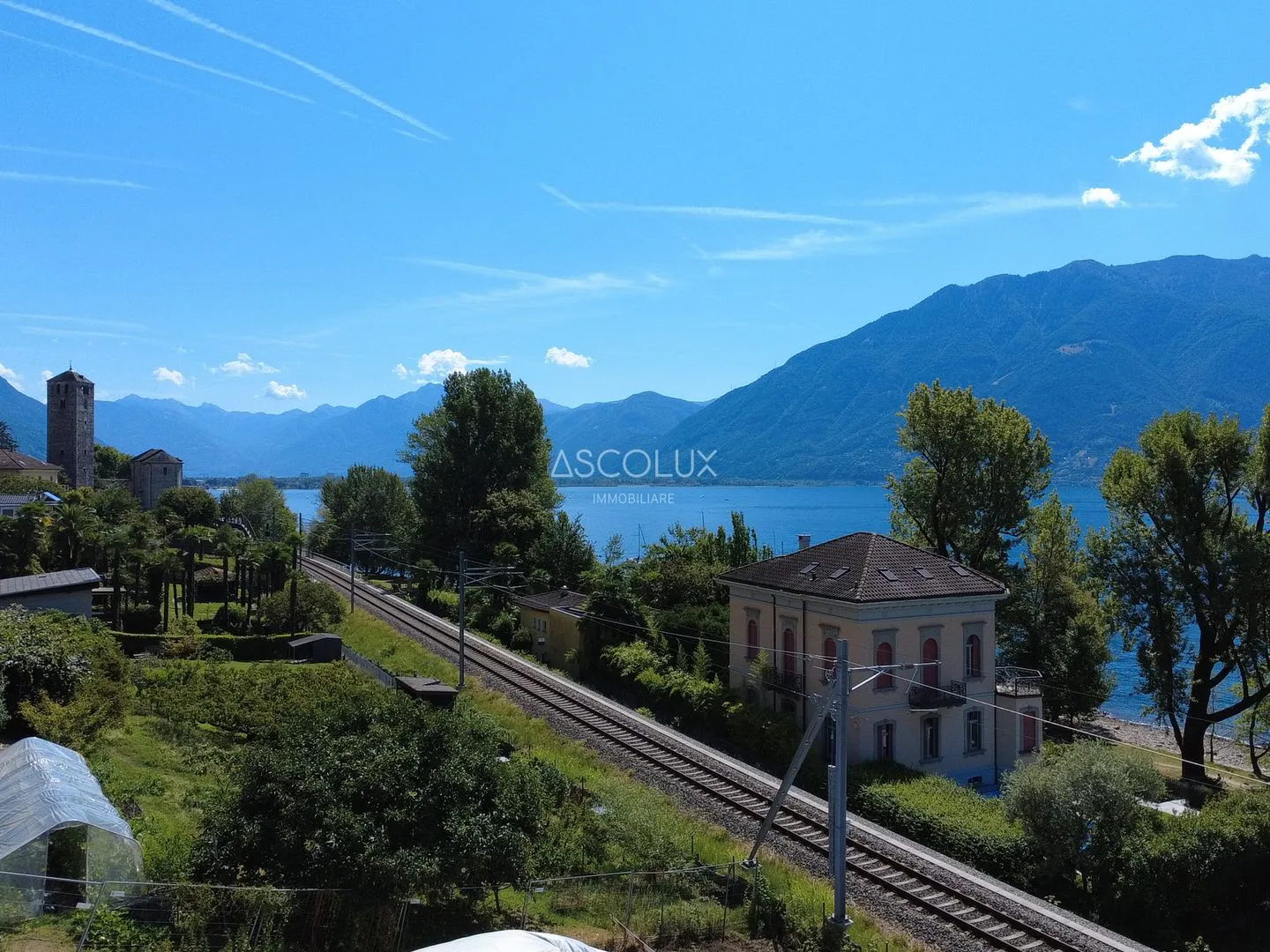Eleganza, Design e Lusso: Ampio appartamento di 4,5 locali con terrazza e vista mozzafiato sul lago - Foto 2 di 13