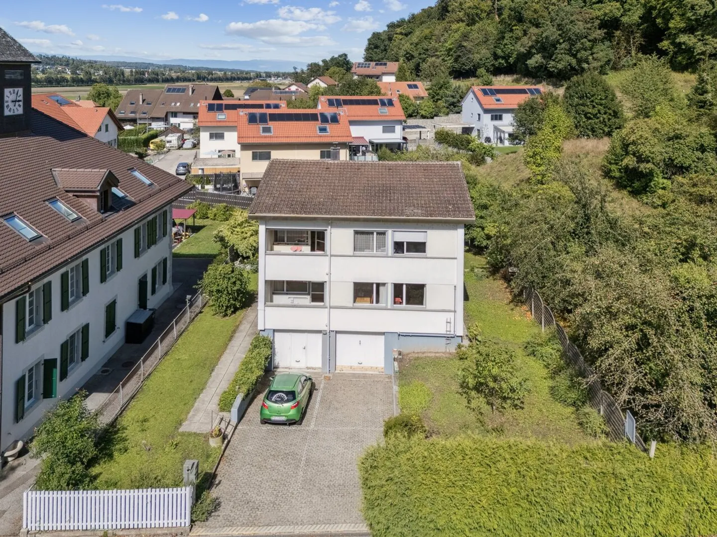 Opportunità rara: casa con due appartamenti nel cuore del villaggio - Foto 2 di 9