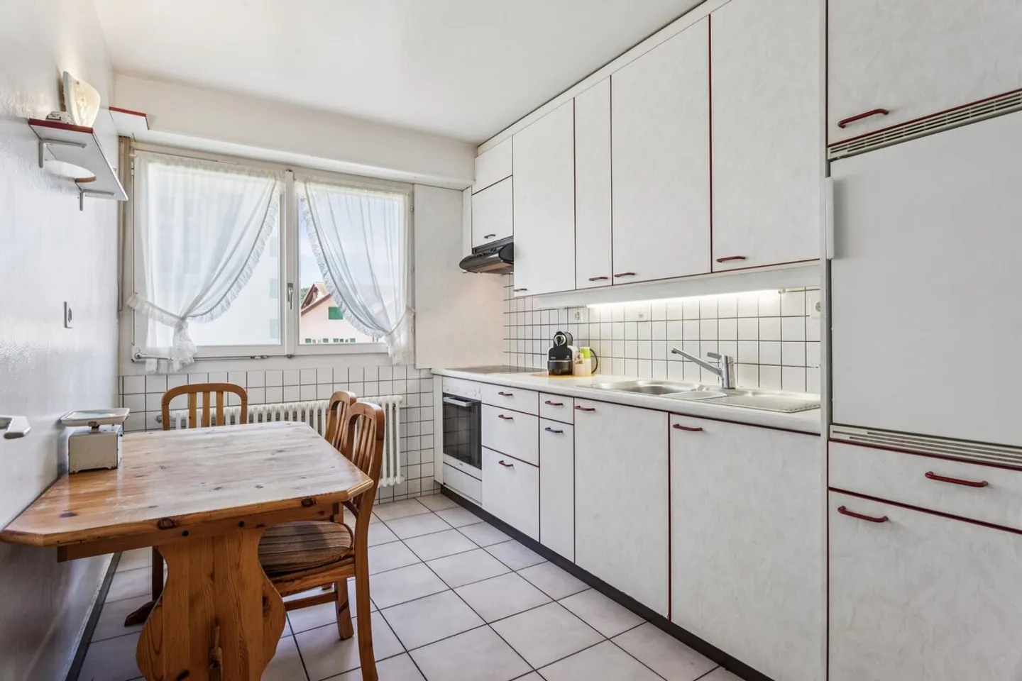 Opportunità rara: casa con due appartamenti nel cuore del villaggio - Foto 4 di 9