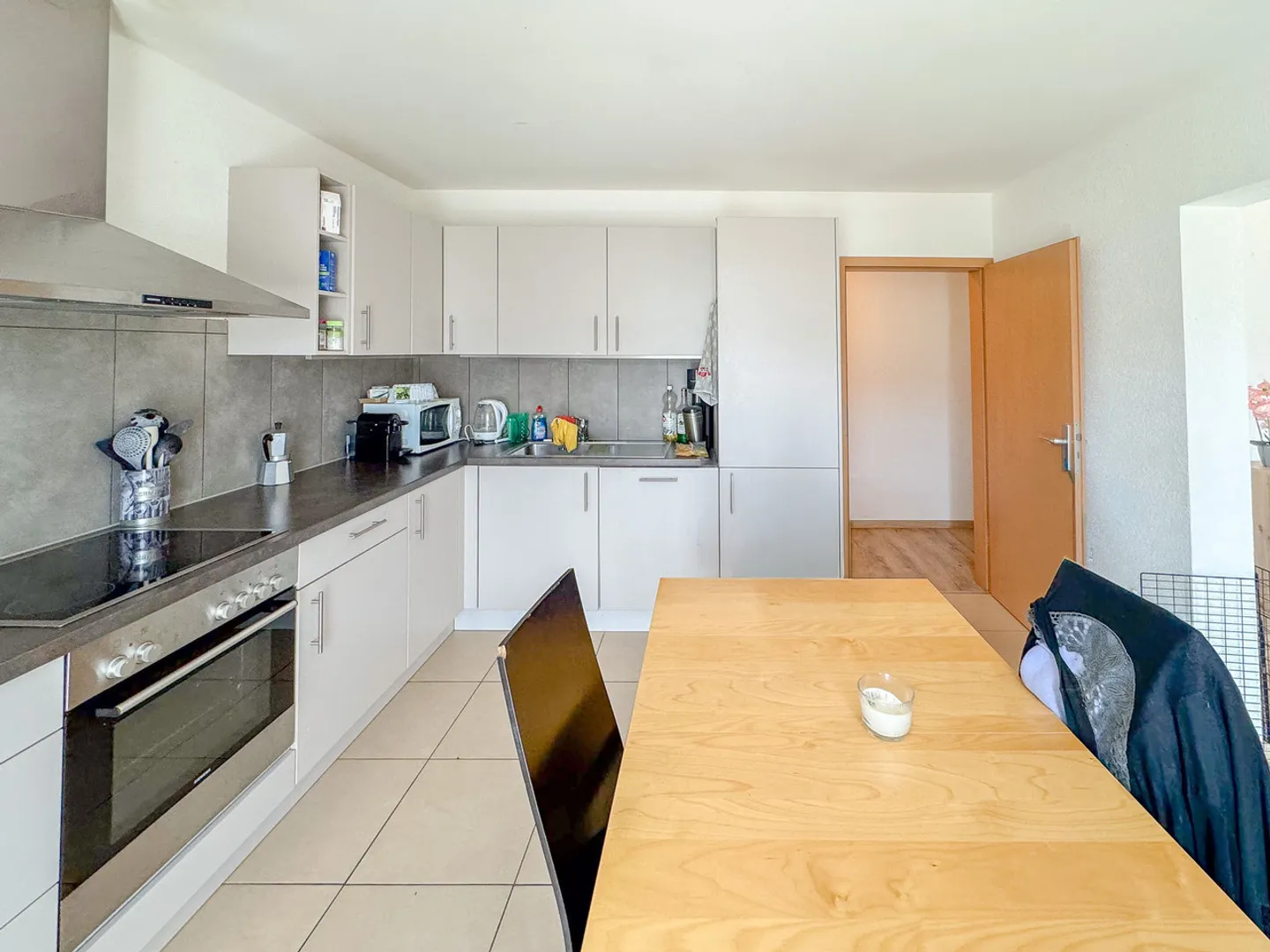 Spazioso appartamento PPE di 6,5 locali con balcone e vista sulle Alpi - Foto 6 di 13