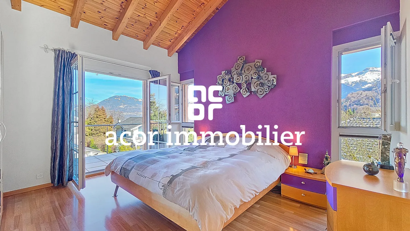 Villa con volumi spettacolari di fronte alle Alpi - Foto 6 di 12