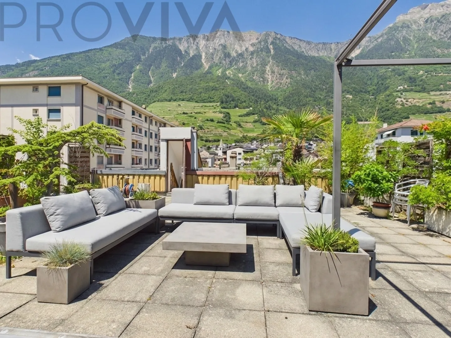 Appartement unique avec terrasse privée (92 m²) au cœur de Fully - Photo 1 sur 7