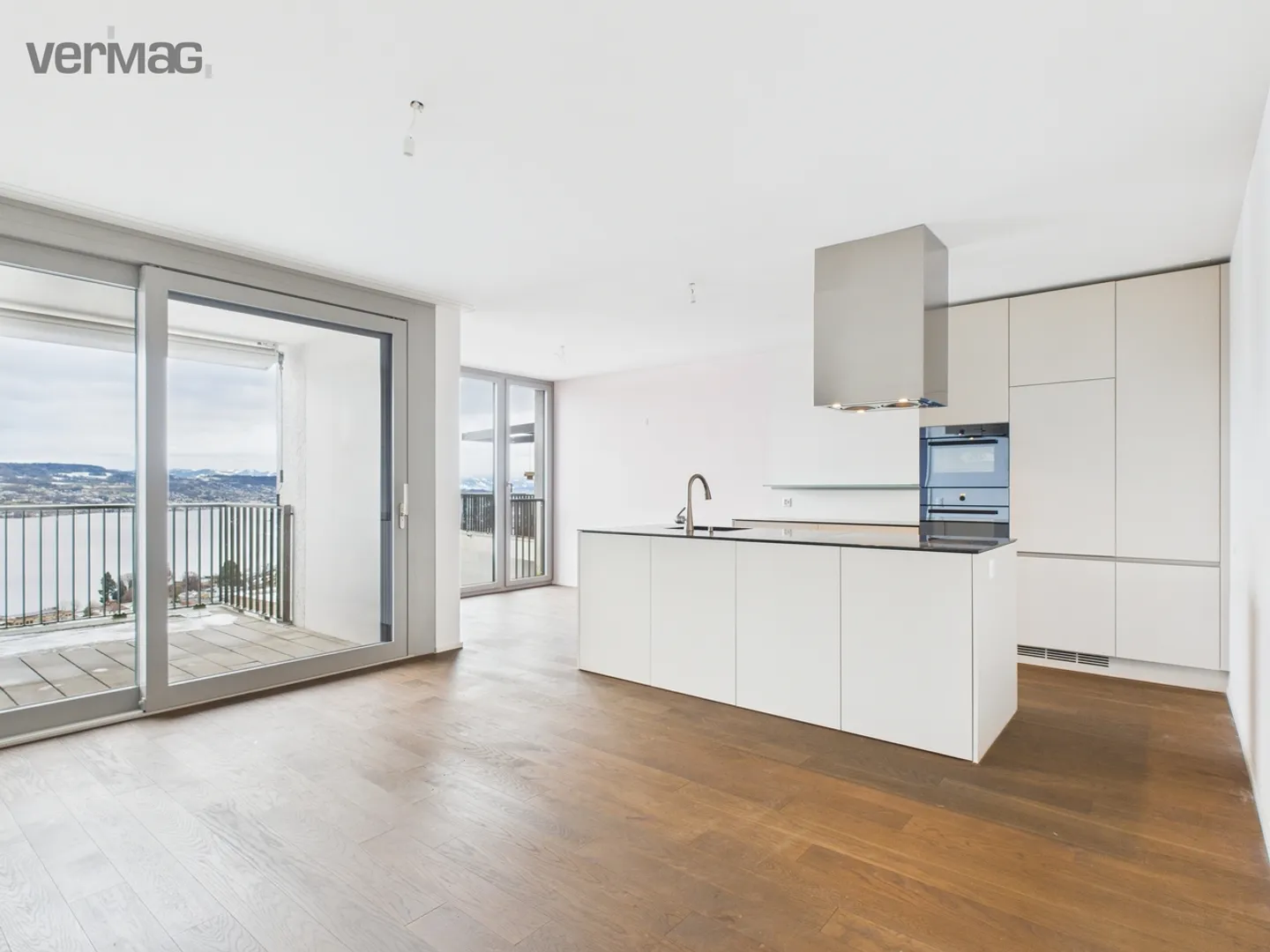 Space. Light. Alpine View. 2.5 Rooms to Breathe at Lake Zurich - Photo 1 of 13