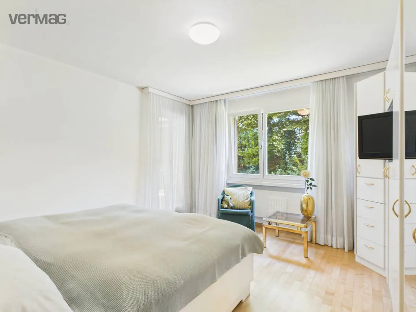 Appartement de 5.5 pièces avec cheminée et jardin ensoleillé - Photo 5 sur 11