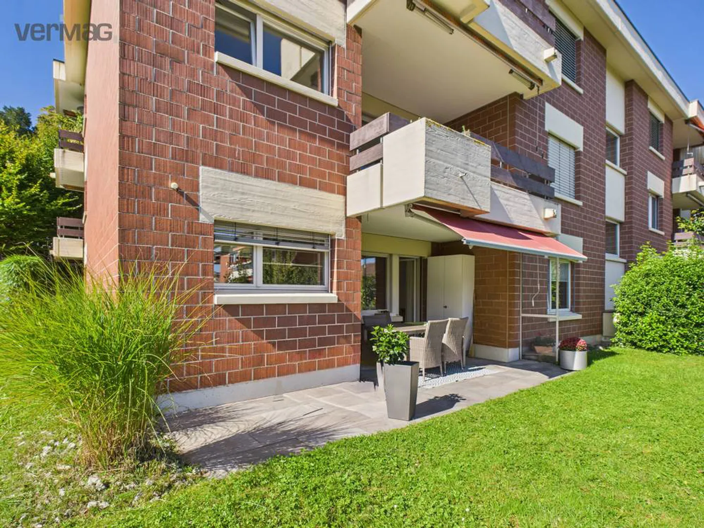 Appartement de 5.5 pièces avec cheminée et jardin ensoleillé - Photo 1 sur 11