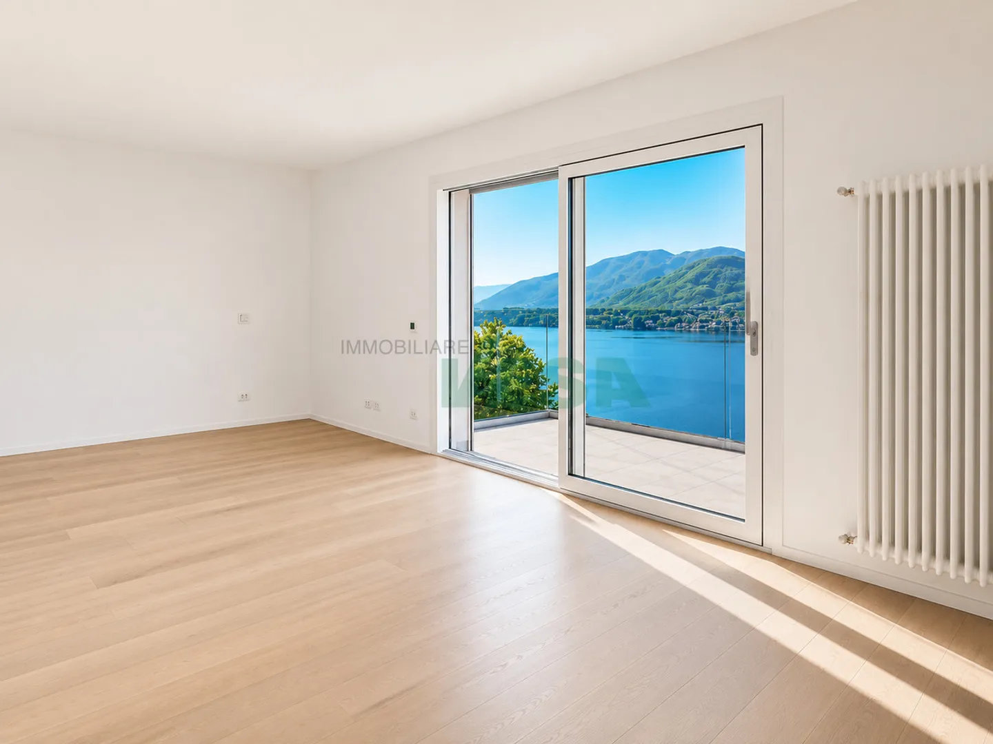Elegante appartamento monolocale con magnifica vista lago - Foto 5 von 11