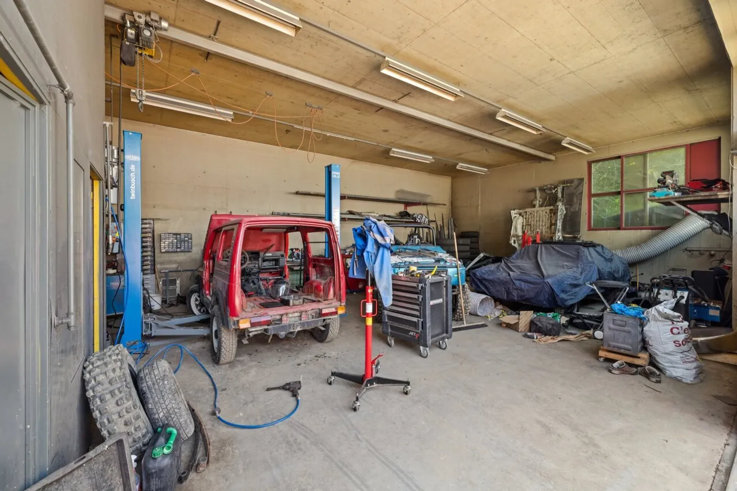 Eigentum mit Garage und professioneller Werkstatt. - Foto 8 von 8