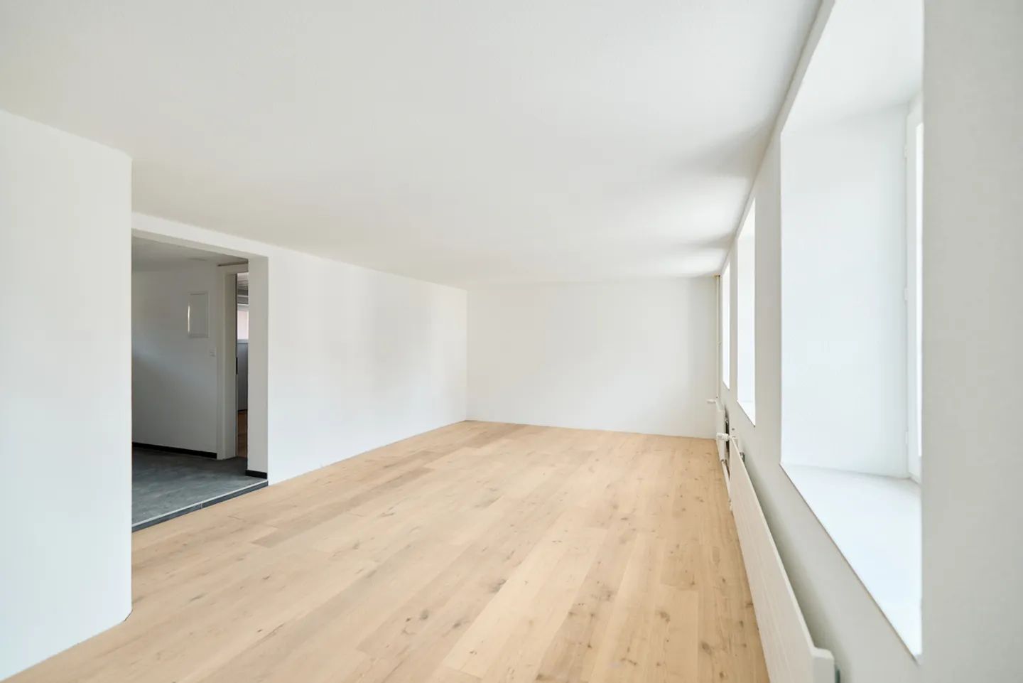 APPARTEMENT AU REZ-DE-CHAUSSÉE 2.5 PIÈCES LUMINEUX ET MODERNE - Photo 4 sur 9