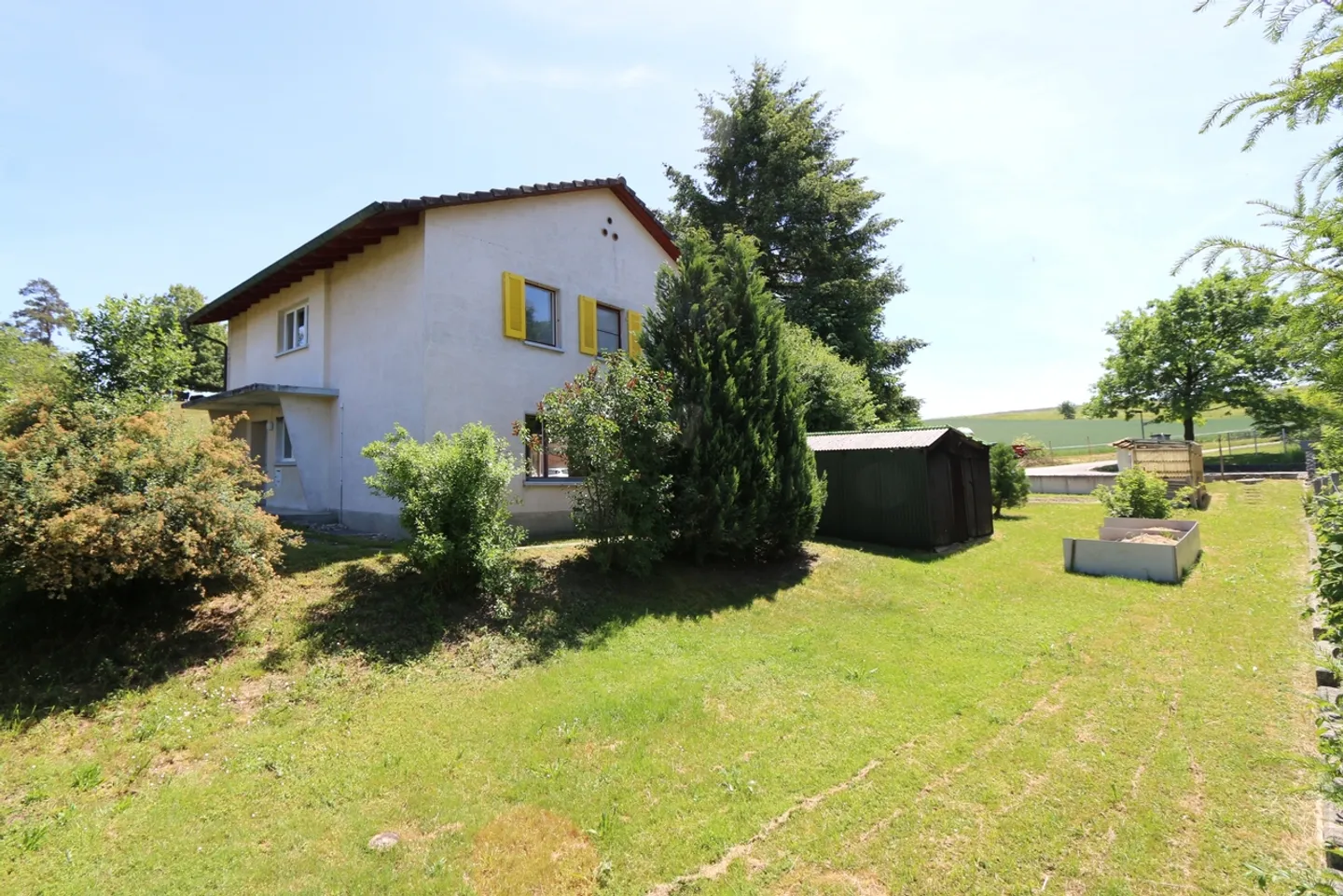 Charmantes Einfamilienhaus mit Garten - Foto 1 von 13
