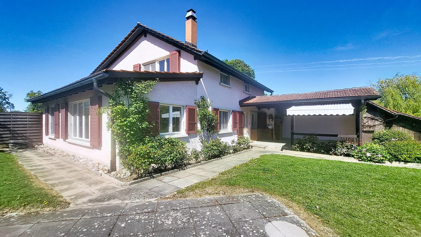 Maison mitoyenne avec jardin - Photo 1 sur 13