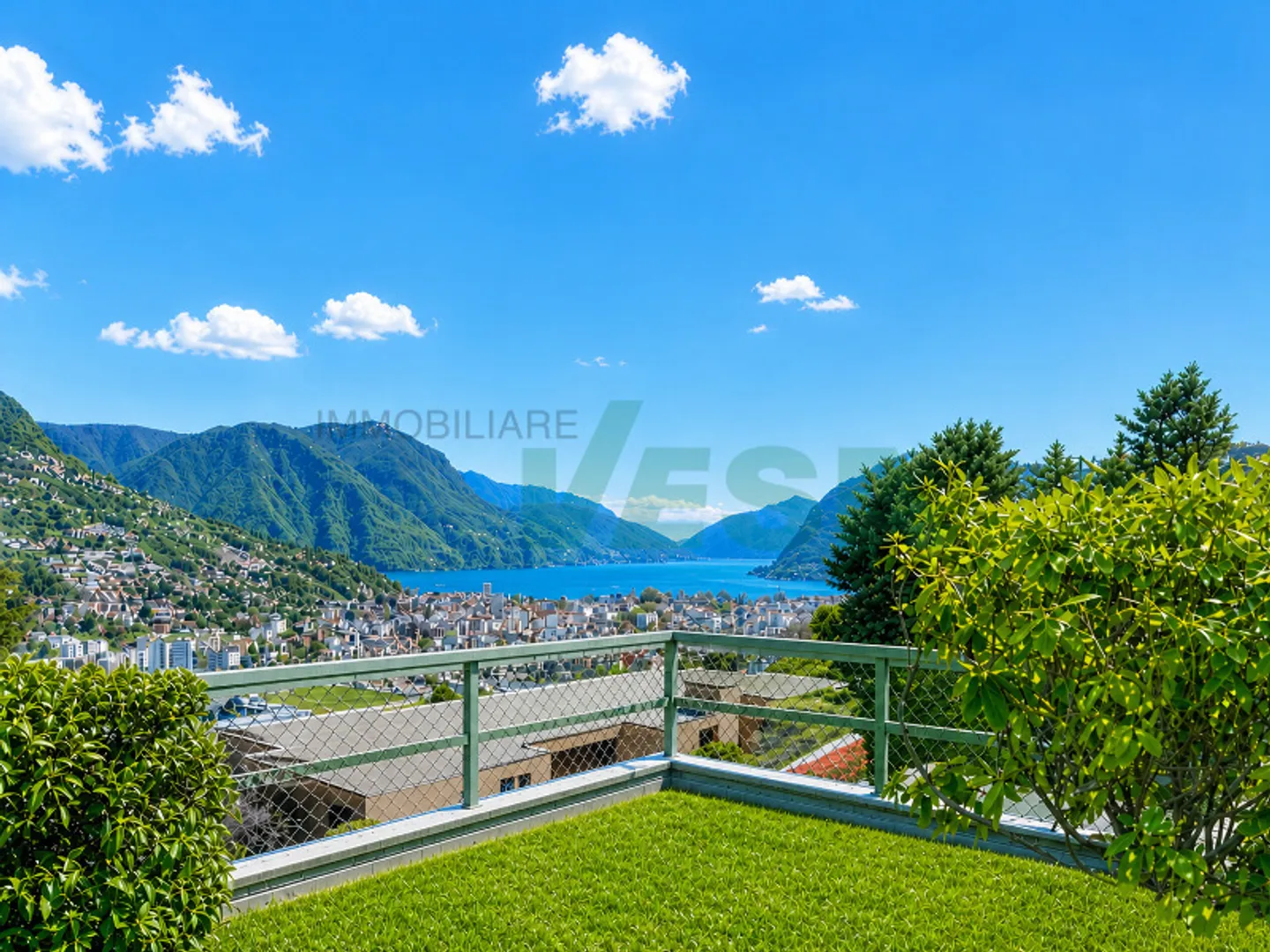 Splendido attico 6,5 locali con fantastica vista lago e bel giardino - Photo 2 of 11
