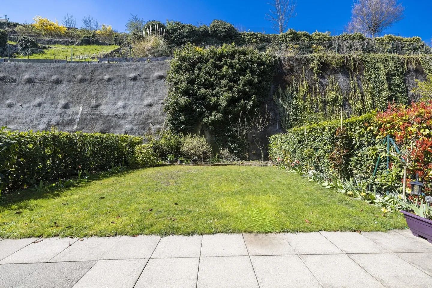 Appartement traversant 4.5 pièces avec jardin au centre de Monthey - Photo 1 of 12