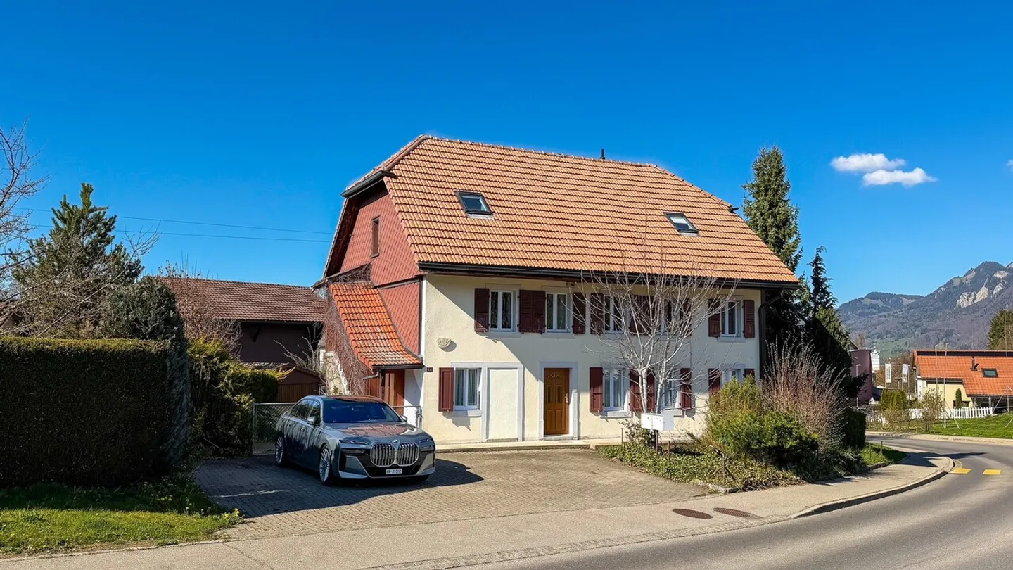 HOUSE WITH 2 SEPARATE UNITS, GARAGE AND PARKING SPACES - Photo 1 of 13