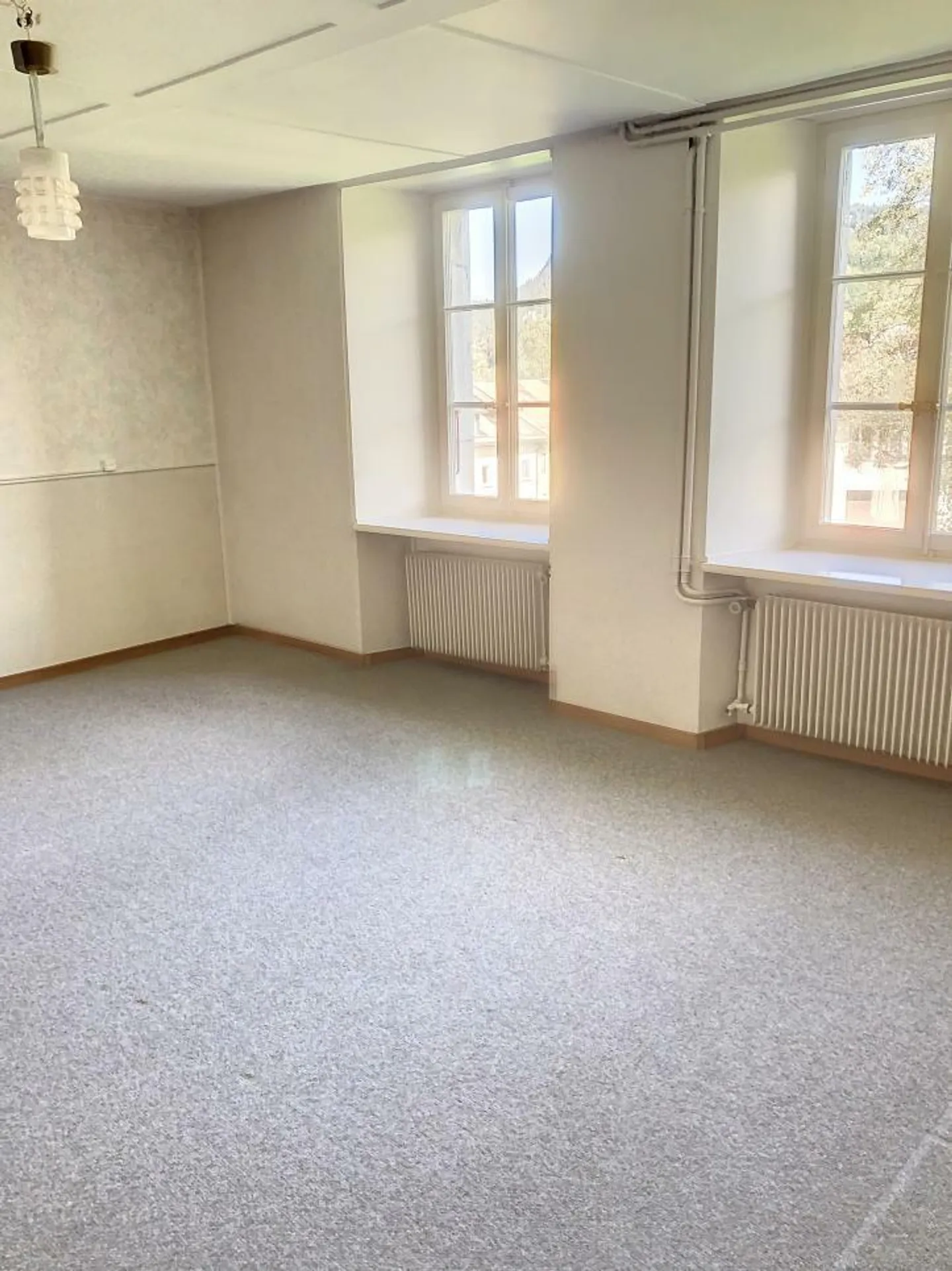 Appartement au rez avec jardin et place de parc couvertes - Photo 3 sur 6