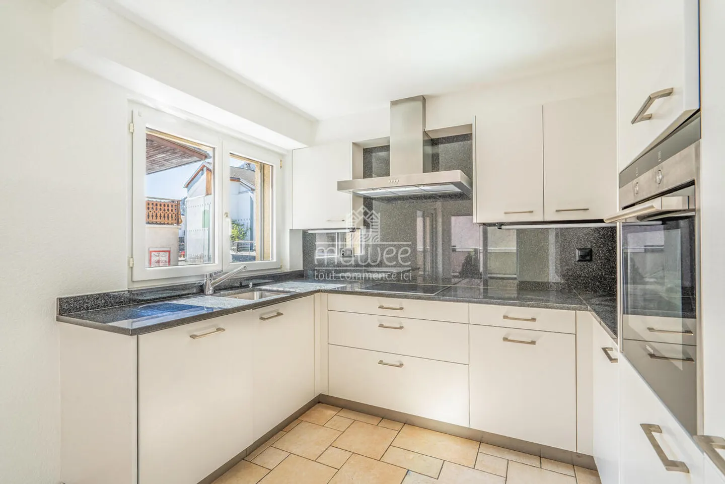 Appartement rénové en 2026 avec grande terrasse dans un petit immeuble - Photo 2 of 13