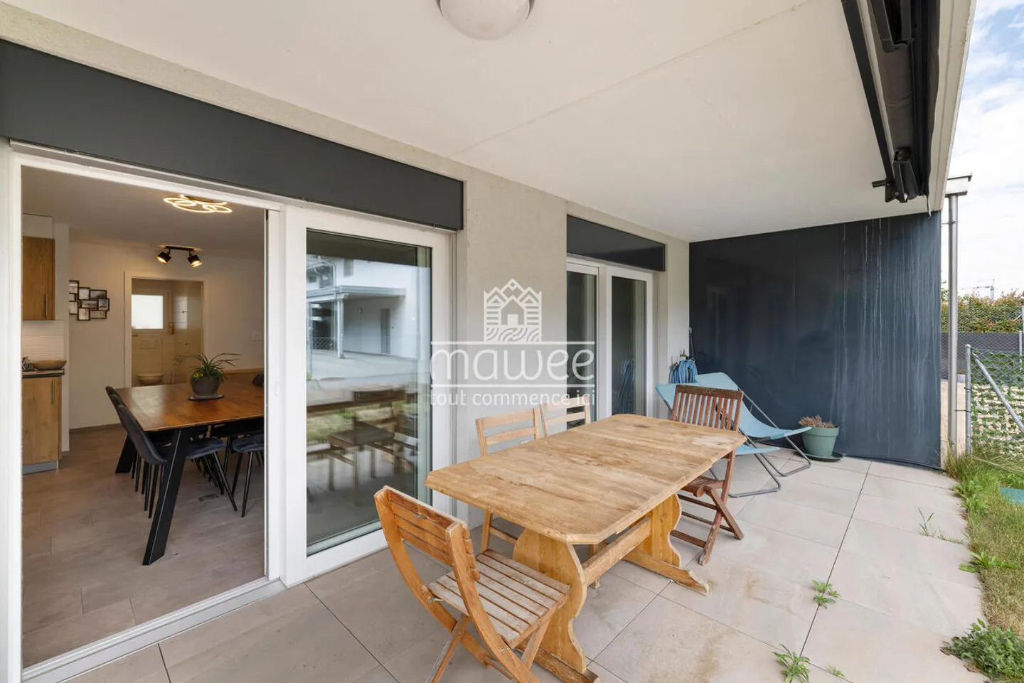Charming 3.5-room apartment with terrace, garden, and two parking spaces - Photo 4 of 13