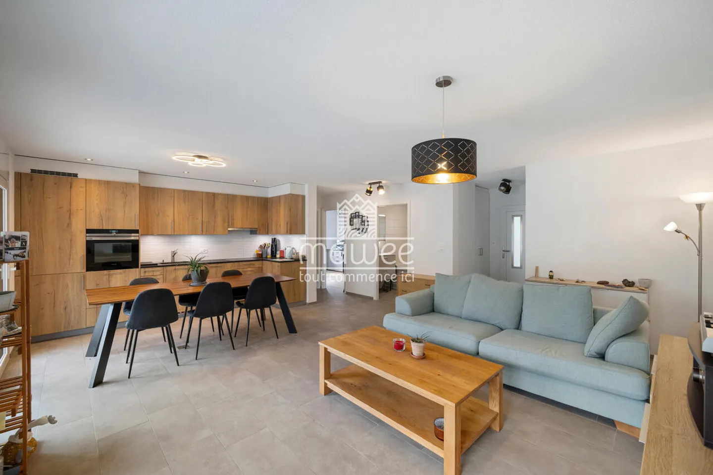 Charming 3.5-room apartment with terrace, garden, and two parking spaces - Photo 1 of 13