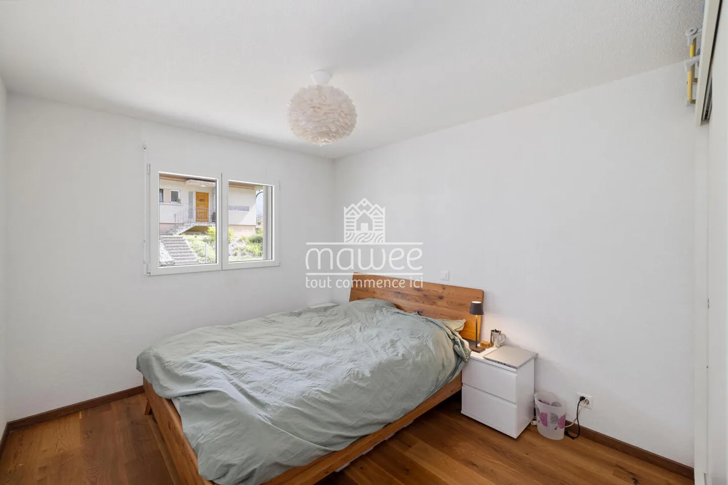Charming 3.5-room apartment with terrace, garden, and two parking spaces - Photo 10 of 13