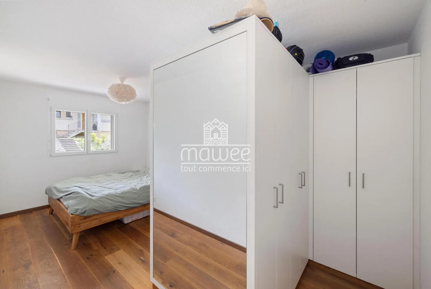 Charming 3.5-room apartment with terrace, garden, and two parking spaces - Photo 11 of 13