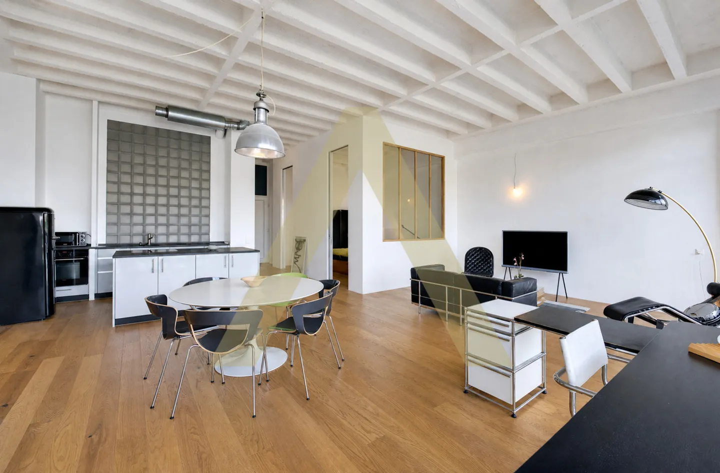 Eine 2,5-Zimmer-Wohnung mit industriellem Erbe im Herzen von Lausanne - Foto 3 von 7