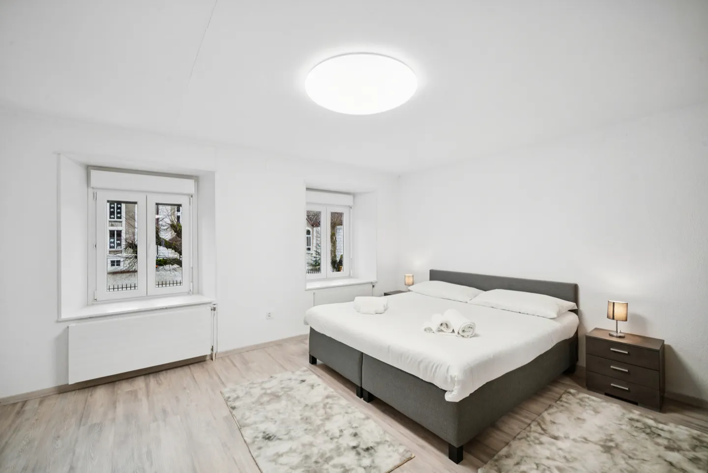 Haus mit zwei Wohnungen im Herzen des Dorfes Môtiers - Foto 7 von 12