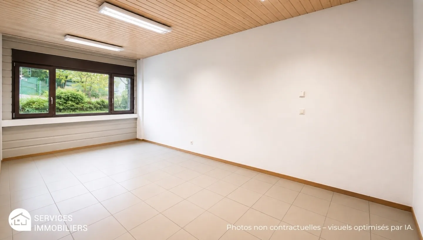 Local commercial lumineux très bien situé - Foto 1 von 7