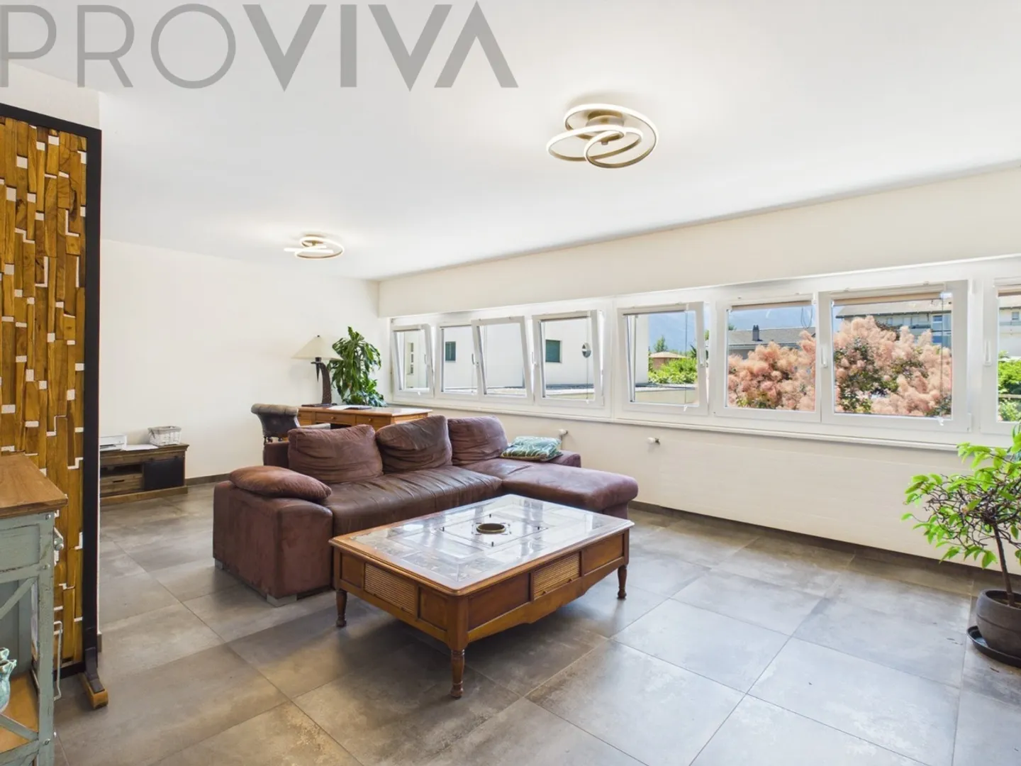 Appartement unique avec terrasse privée (92 m²) au cœur de Fully - Photo 2 sur 7