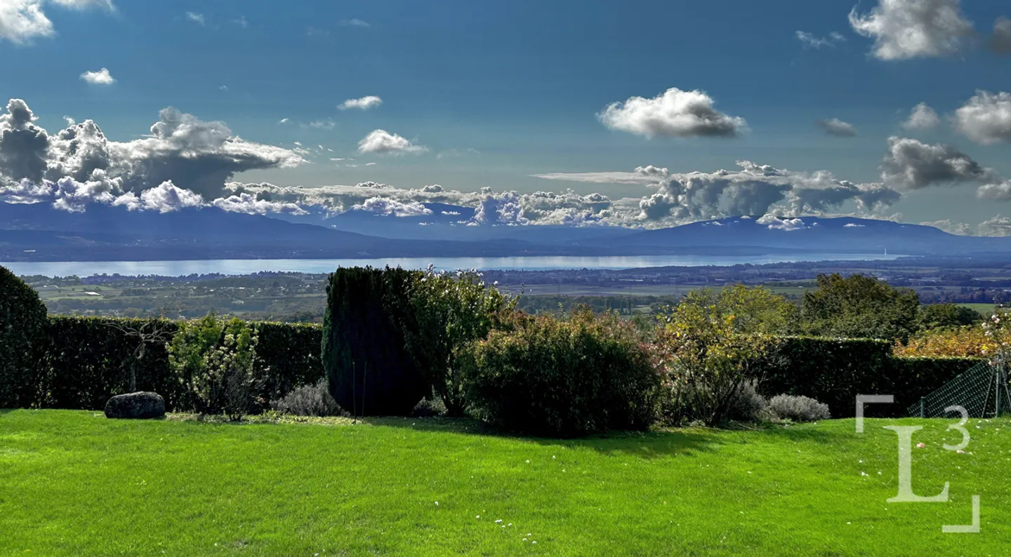Wohnung mit Garten und Panoramablick auf den See - Foto 1 von 13