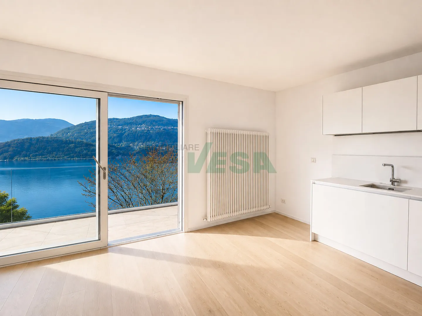 Elegante appartamento monolocale con magnifica vista lago - Foto 4 von 11