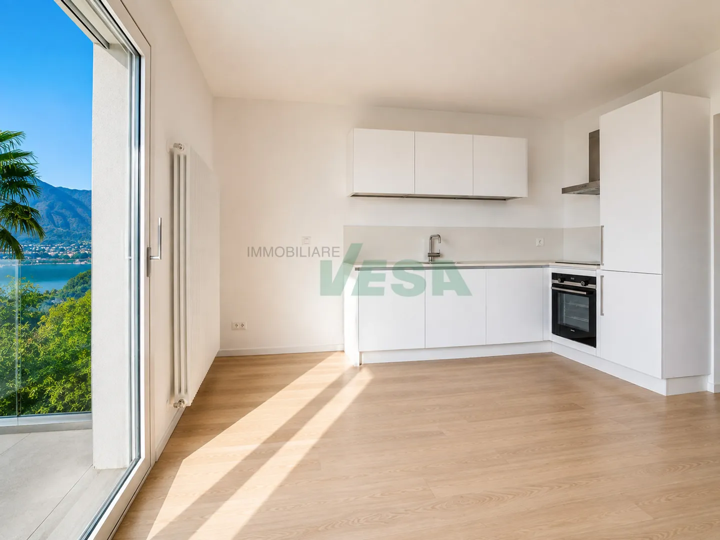 Elegante appartamento monolocale con magnifica vista lago - Foto 8 von 11