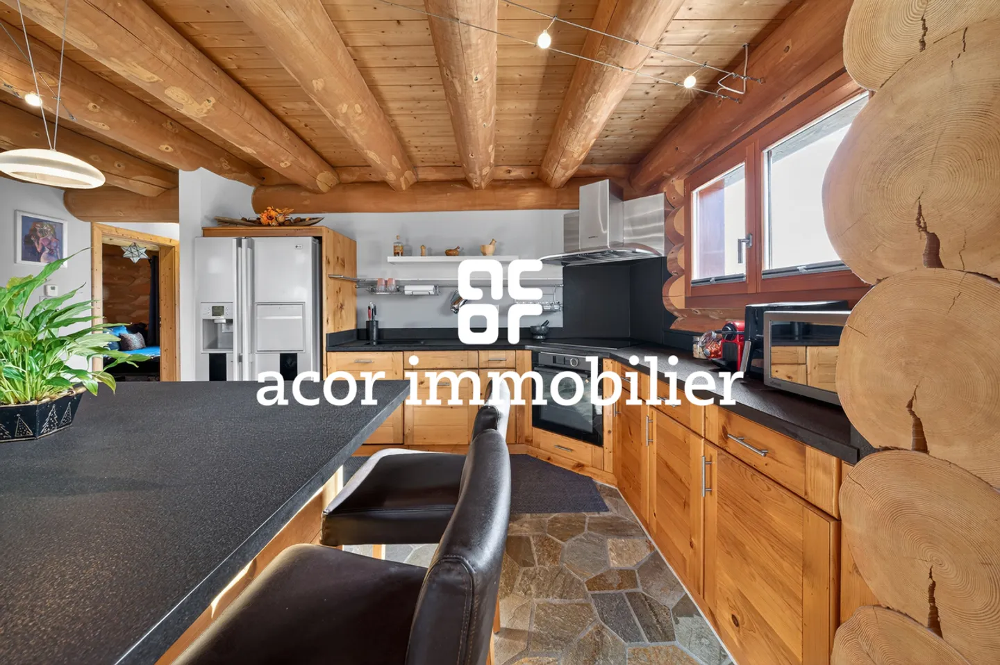 Blockhausvilla im kanadischen Chalet-Stil - Foto 3 von 11