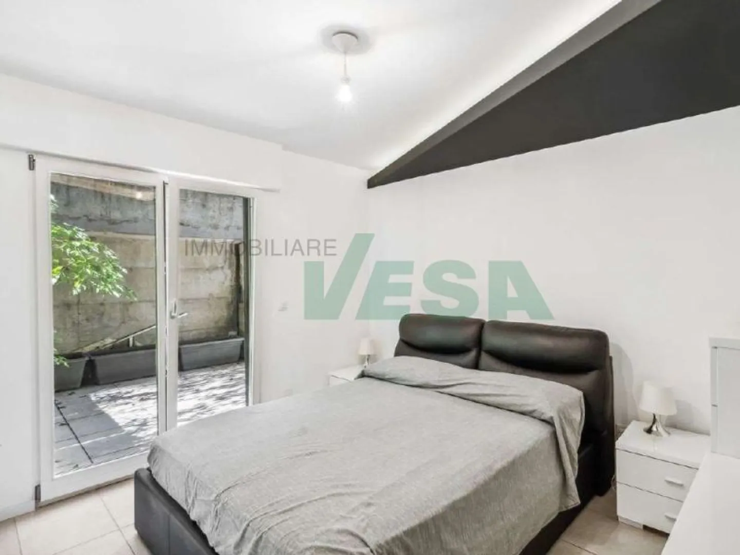 Moderno e luminoso appartamento 2 locali con splendida vista lago - Foto 4 von 11