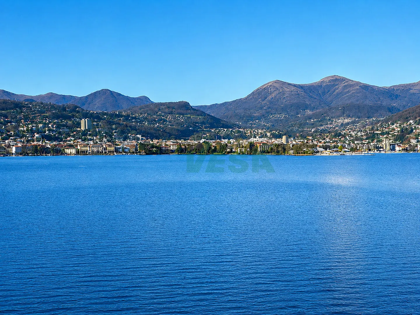Bellissimo terreno con una spettacolare vista sulla baia di Lugano - Foto 1 von 5