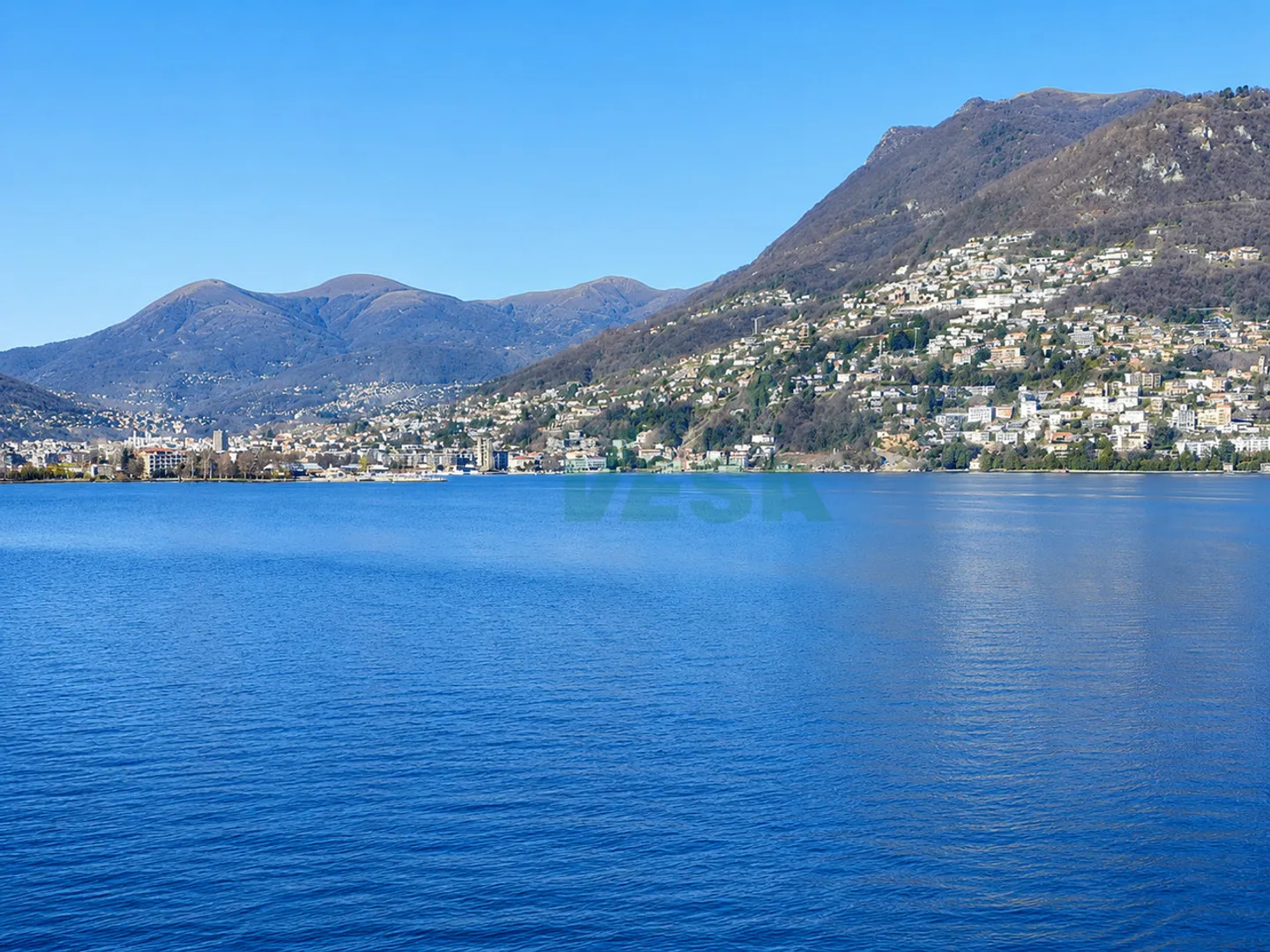 Bellissimo terreno con una spettacolare vista sulla baia di Lugano - Foto 3 von 5